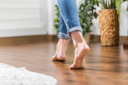 feet-on-hardwood-floor