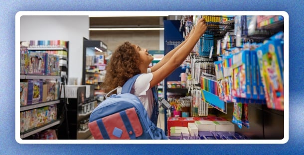 A student and parent getting ready for back-to-school shopping