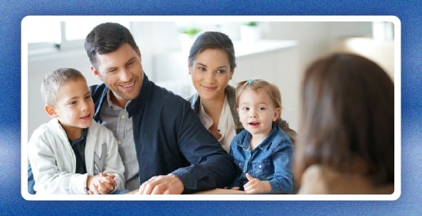 A happy family discussing their kids futures.