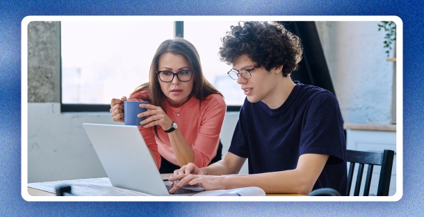 A mother and her son review their financing options.